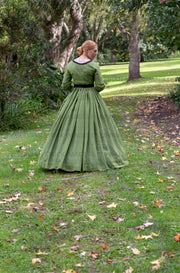 Victorian woman in a green gather front bodice and skirt (Lauren 0054)
